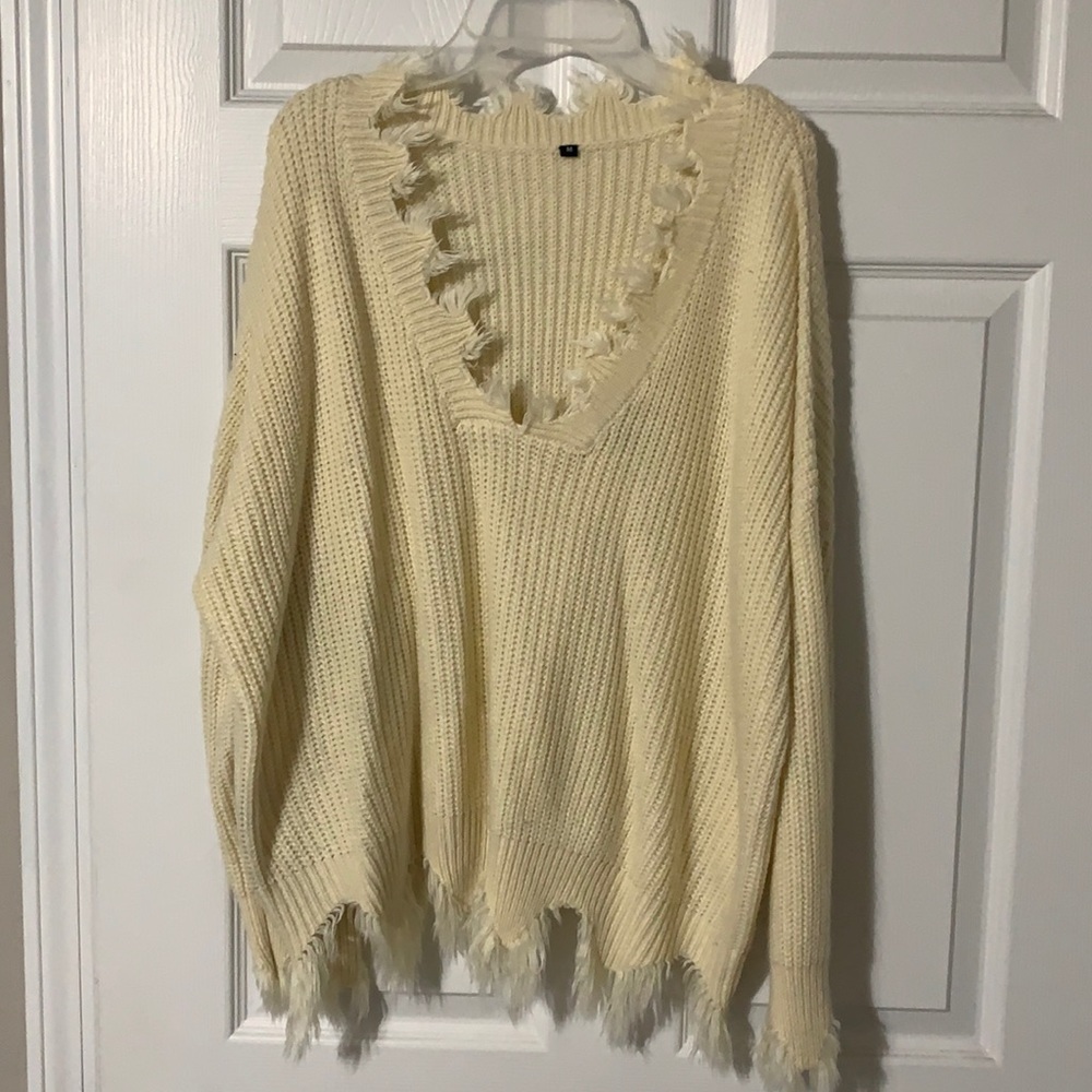 White frayed sweater